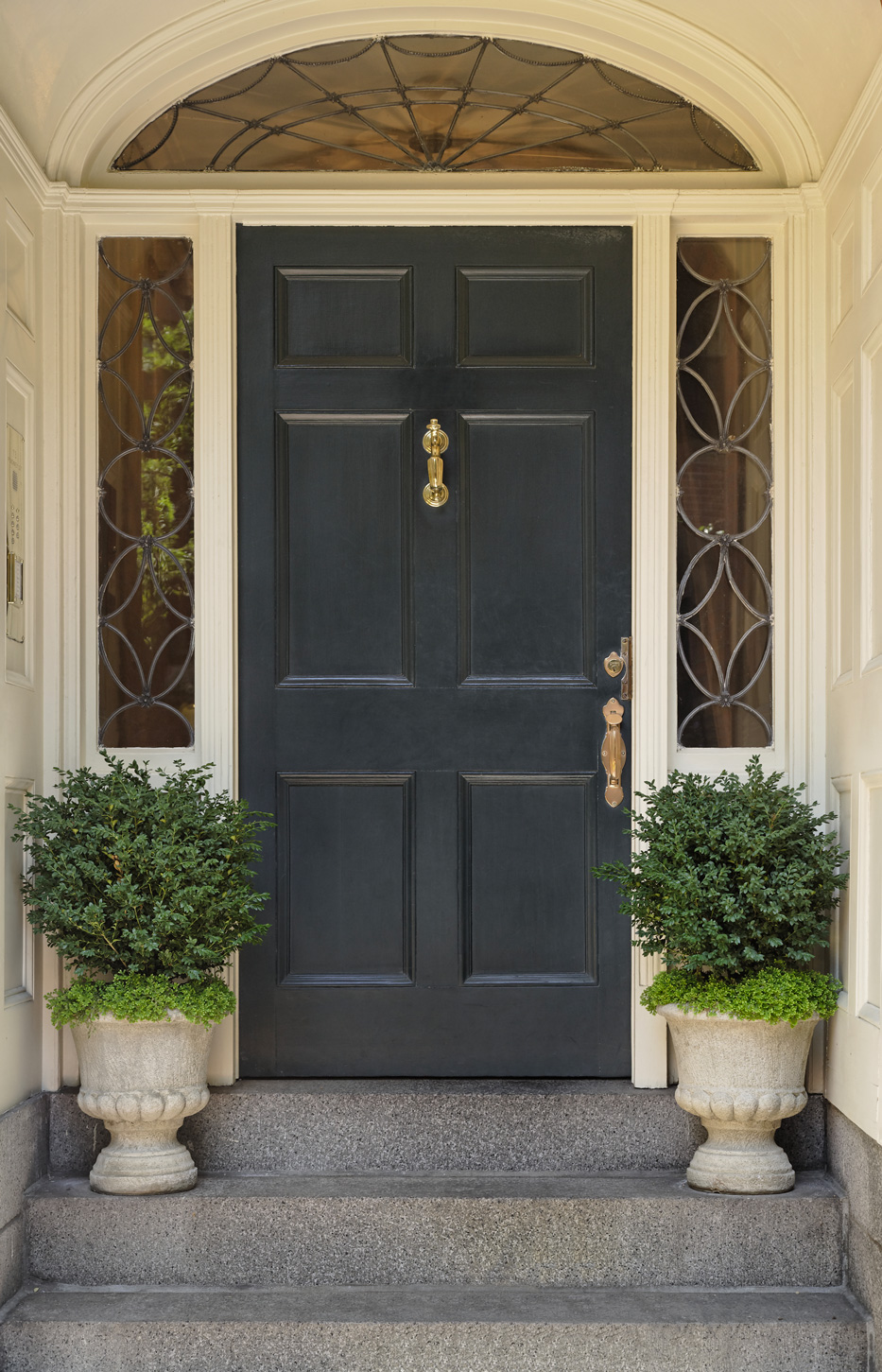 Architectural Detail on a Front Door greenery used to design a front entrance