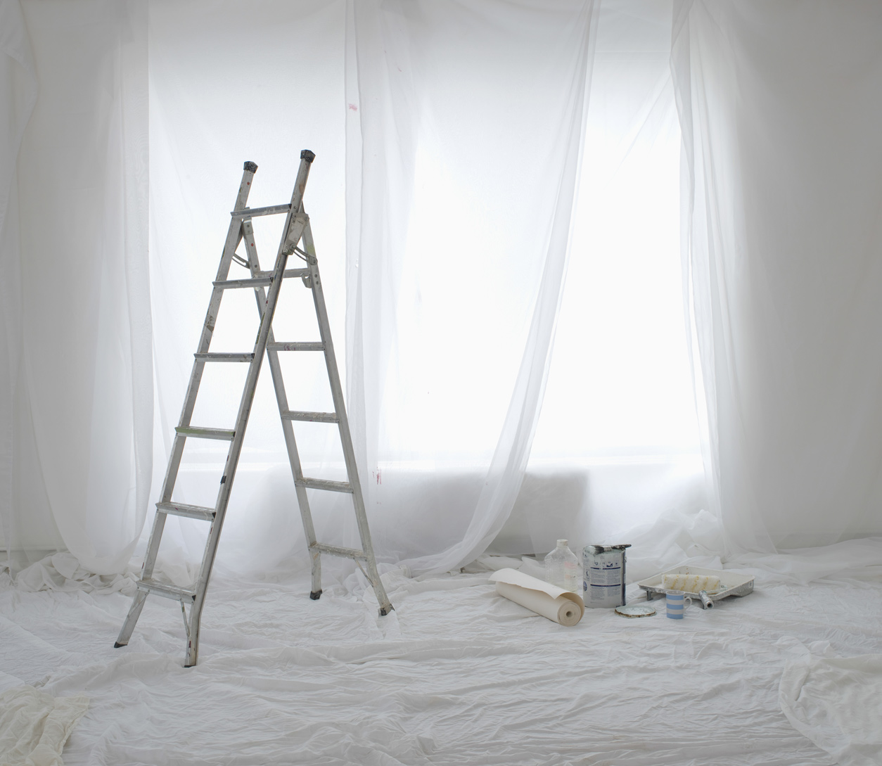 White ladder and curtains