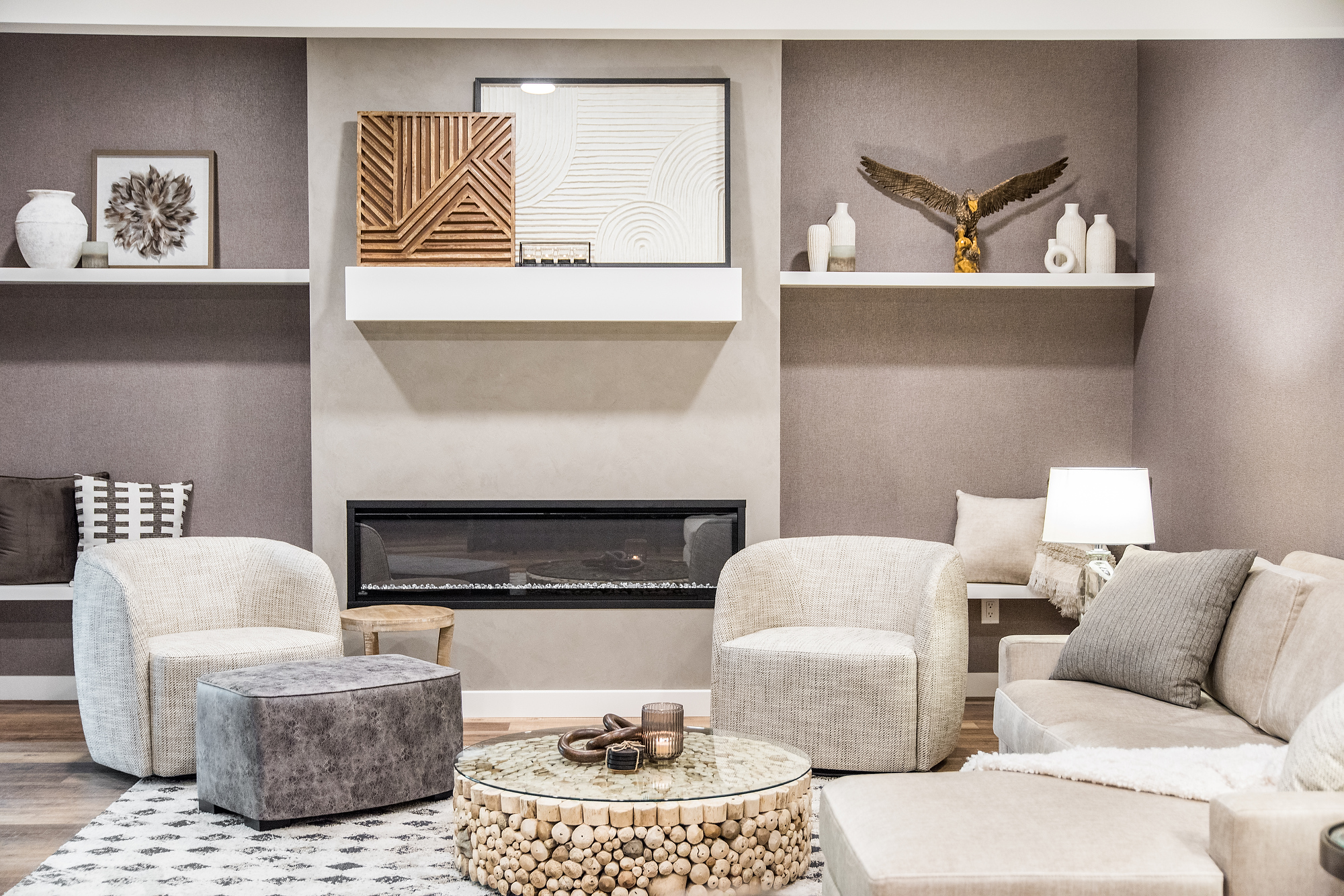 Interior decoration of a basement. Brown textured wallpaper with creme furniture.